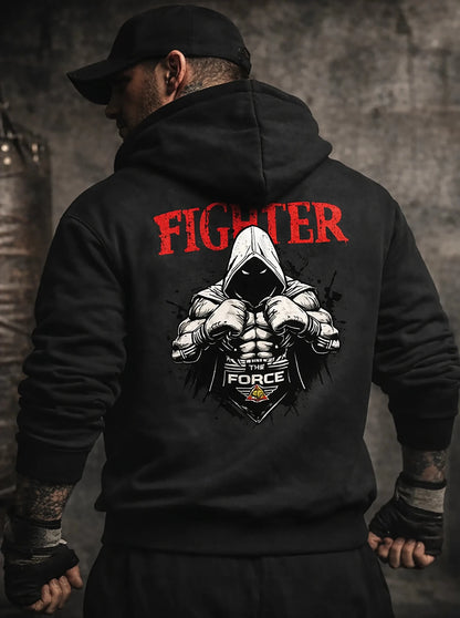 Person wearing a black hoodie with 'FIGHTER' text and graphic design on the back.